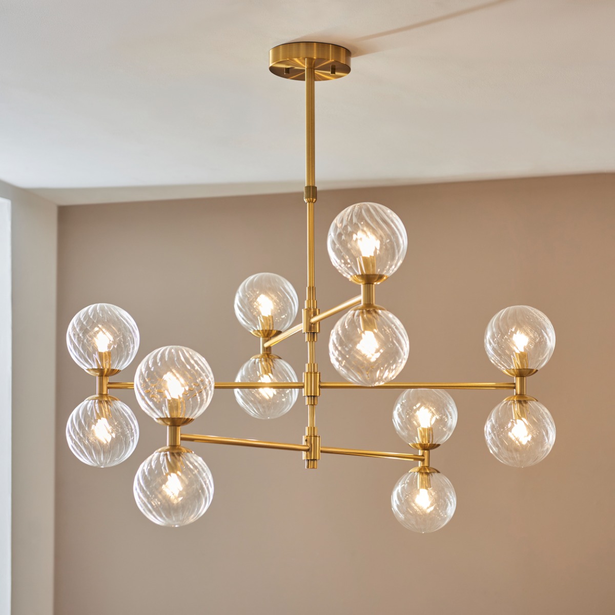 Twin 12 Light Ceiling Pendant Light In Aged Brass With Twisted Glass Shades