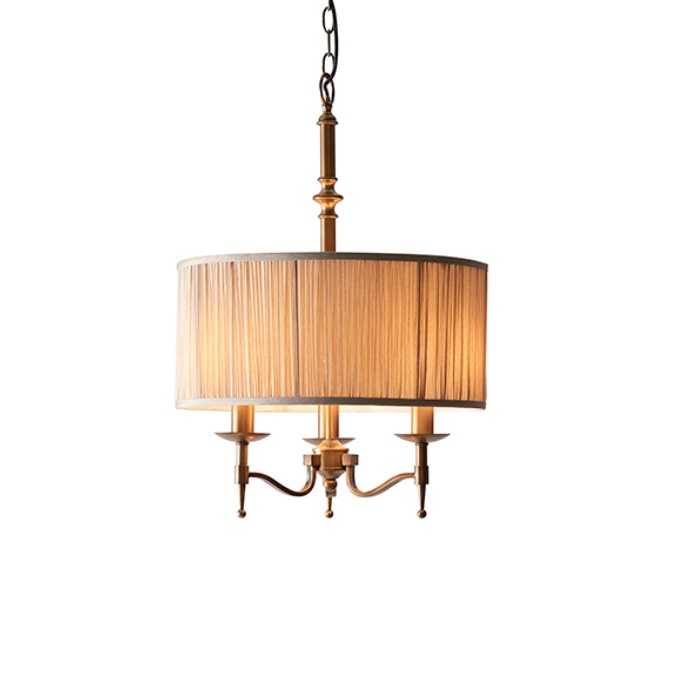 Image of Interiors 1900 63630 Stanford Antique Brass 3 Light, One Shade Ceiling Pendant Light With Beige Shade